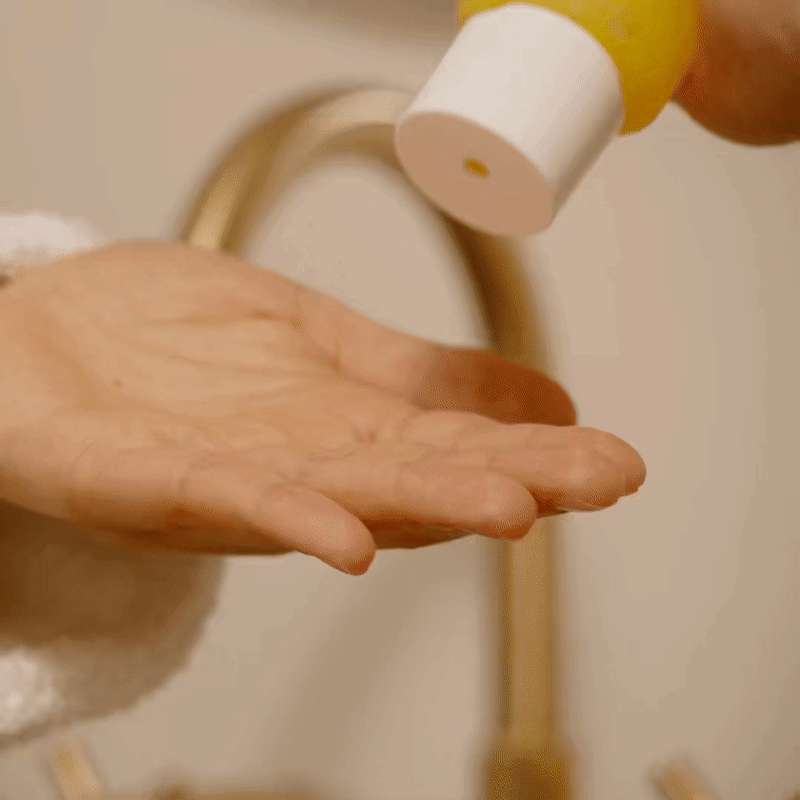 woman applying PREGAME Jelly Cleanser face wash